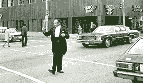 Maestro Laszlo Gati conducting traffic