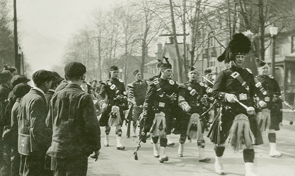 Pipers Escort the 99th to the Station